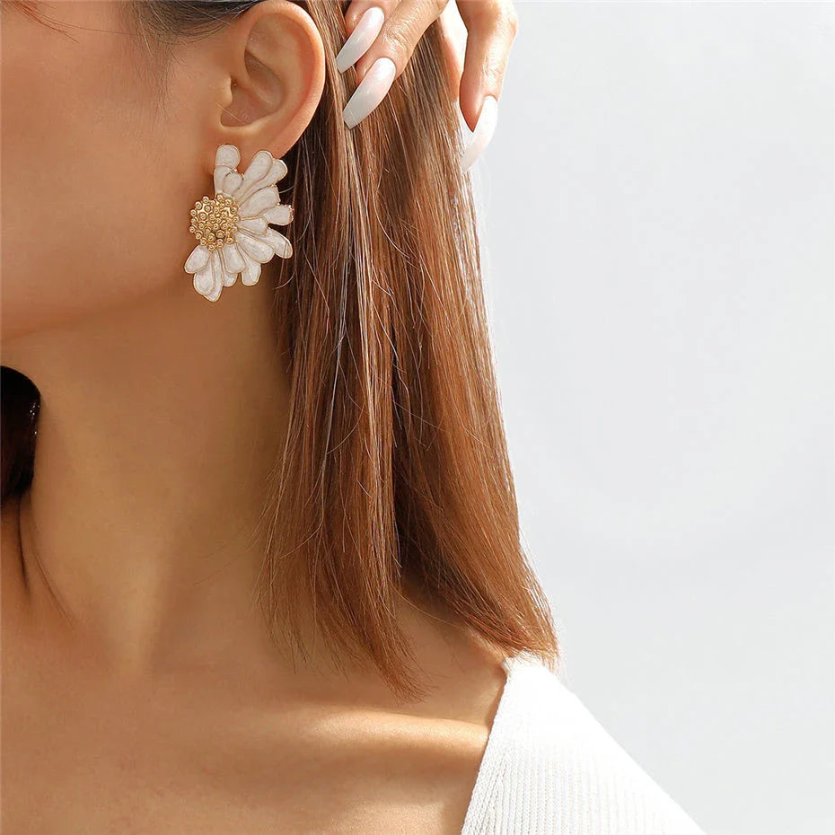 Vibrant, multi-coloured floral petal stud earrings with a blend of bohemian and modern influences