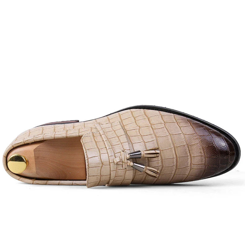 Premium British-crafted men's pointed leather dress shoes with tassels in black color
