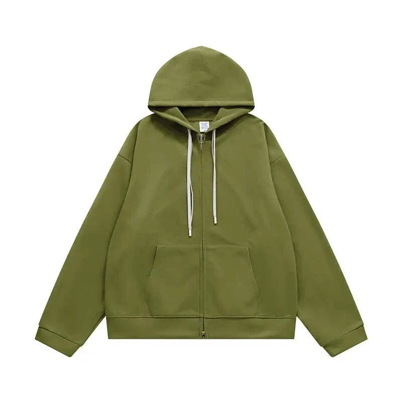A premium British cotton and polyester hoodie jacket with a zip-up design, featuring a relaxed, oversized fit for everyday comfort and style.