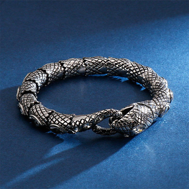 Elegant stainless steel snake bracelet in a sleek, polished black finish for men