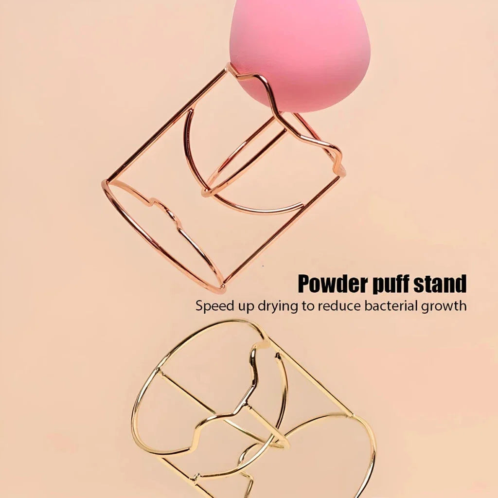 Elegant stainless steel makeup sponge drying rack in gold and rose gold finishes, designed to keep your beauty tools organised and fresh.
