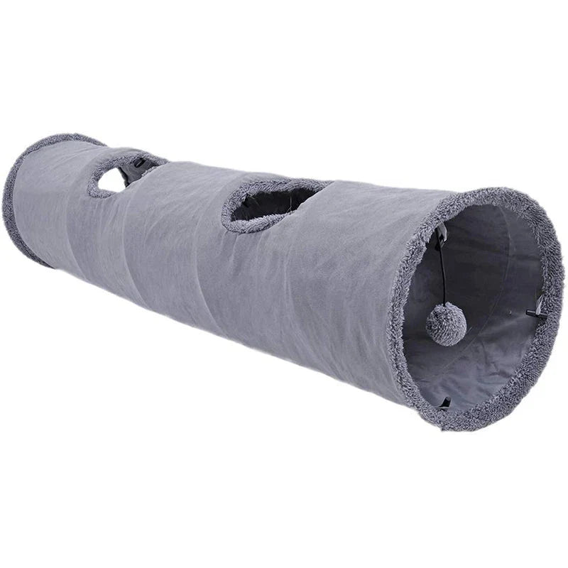 A collapsible cat tunnel made of crinkle suede with a peek-a-boo hole and dangling ball, providing a stimulating and entertaining play experience for cats.