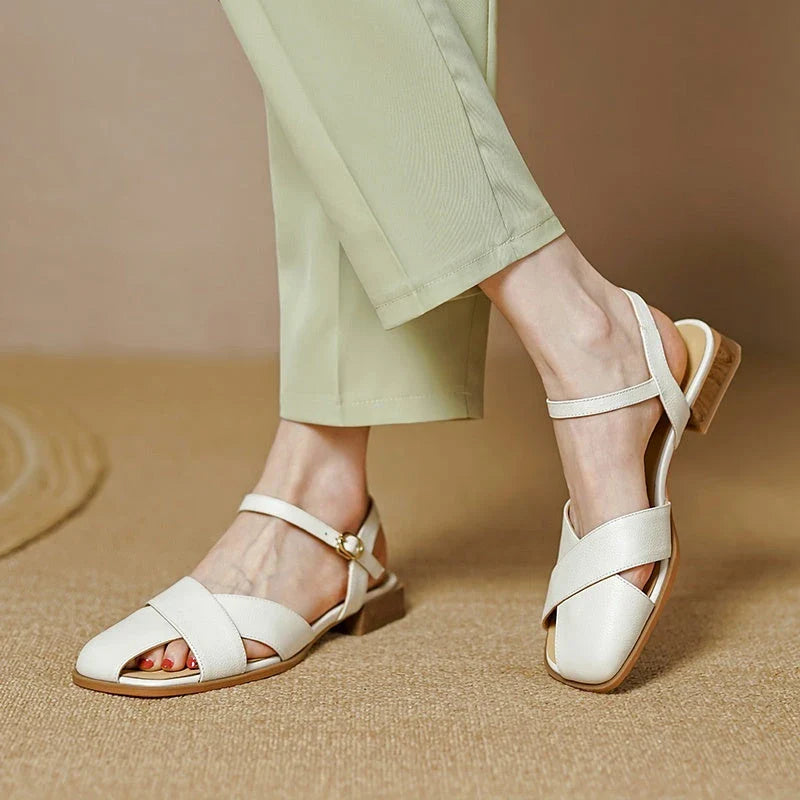 Stylish and comfortable low-heel leather sandals in green, perfect for summer wear