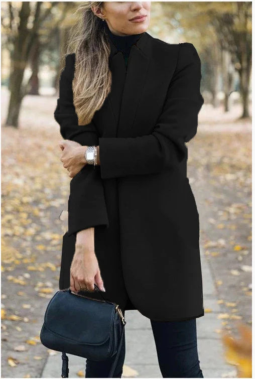 Premium British woollen coat with stand collar, featuring a sleek, slim-fit silhouette and subtle stitching details