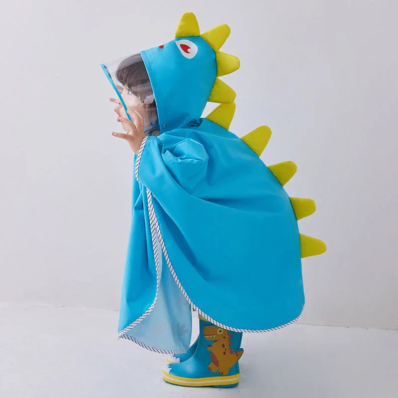 A colourful dinosaur-themed waterproof rain poncho for children, designed to keep them dry and happy during outdoor activities.