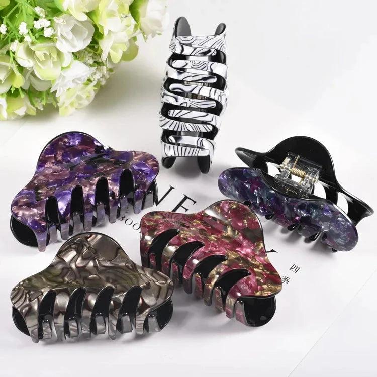 Elegant large floral acrylic hair clips in various colours for a sophisticated look