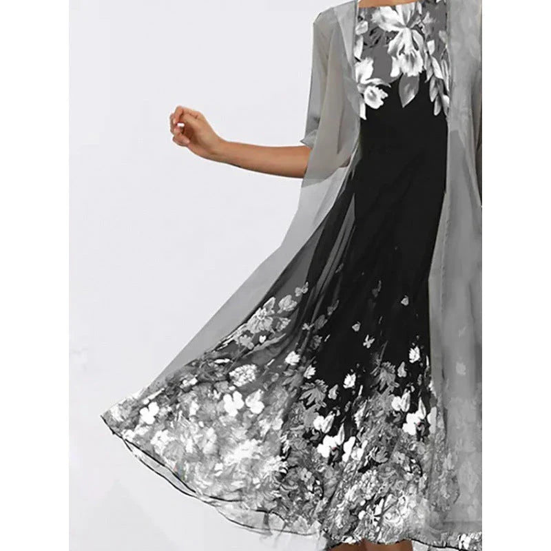 A stylish, multi-colour long dress made from high-quality chiffon fabric, featuring a comfortable swing skirt and versatile 3/4 sleeves.
