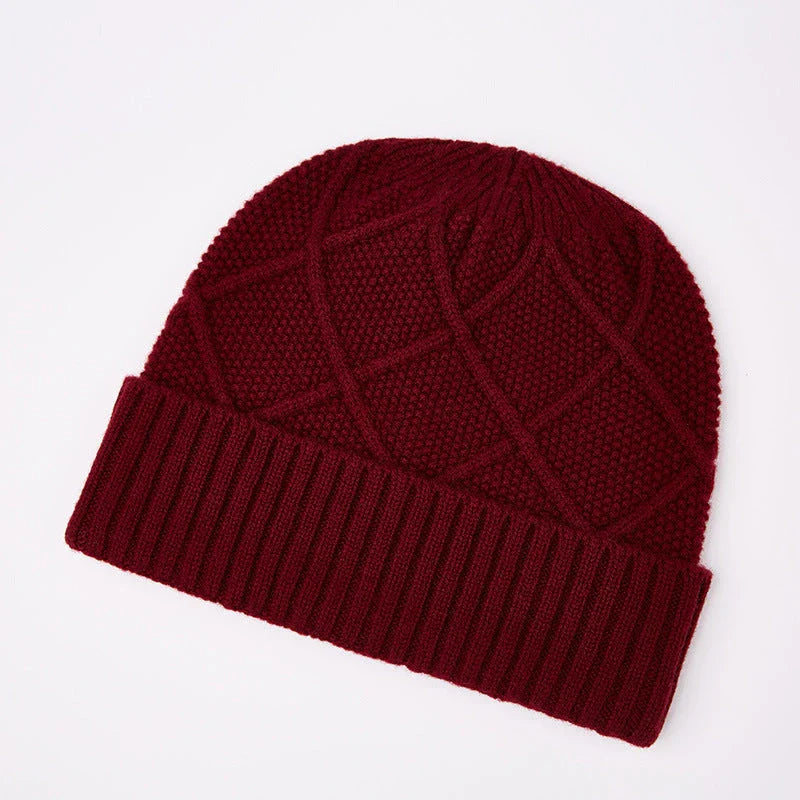 Premium knitted hat in various colours with a dome-shaped design, concave stripe pattern, and adjustable fit for warm outdoor fashion