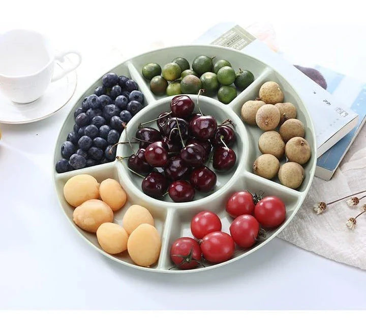 Stylish round snack plate in green and khaki colours, perfect for serving fruit, nuts, or hors d'oeuvres at UK dinner parties and tea times.