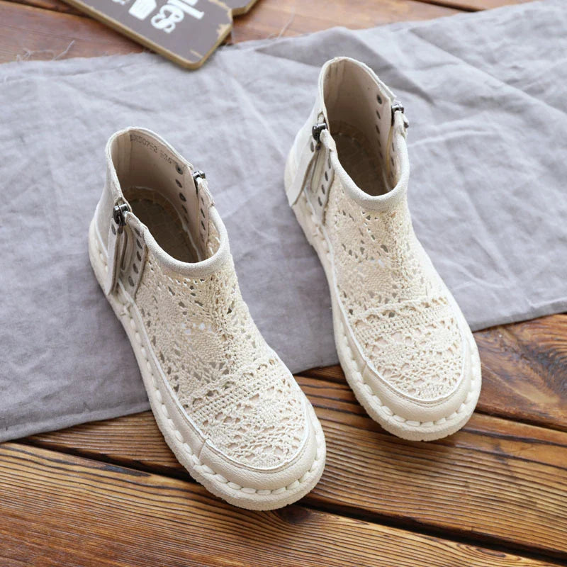 Stylish flat-soled women's Martin boots in grey and beige colours, featuring a durable denim upper and sturdy rubber sole for all-day comfort and support.