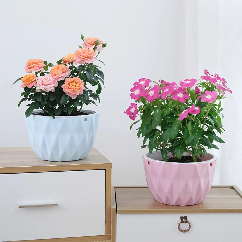 Modern white polyresin wall-mounted flower planter with sleek, contemporary design