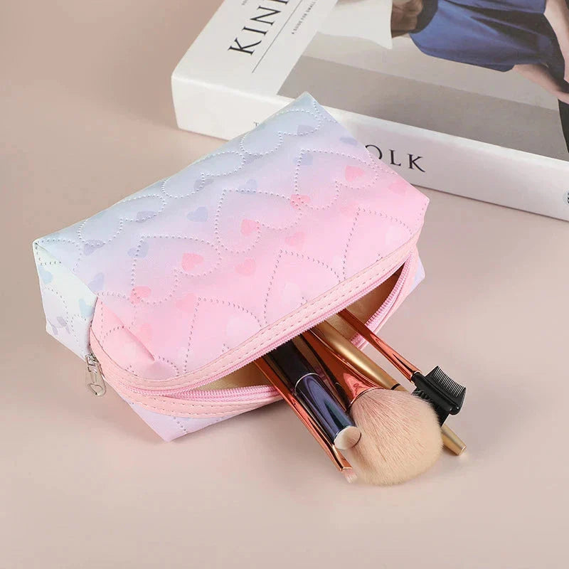 Stylish large-capacity waterproof cosmetic bag with heart pattern design, perfect for organising makeup, skincare, and travel essentials
