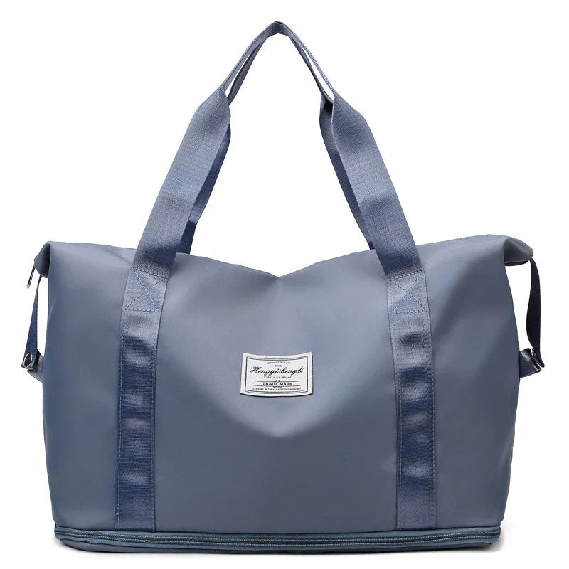 Large capacity travel bag with multiple pockets for fitness, gym, and outdoor activities