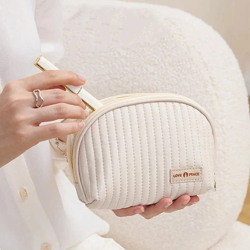 Compact Shell Cosmetic Bag for Women - A stylish and functional makeup pouch for the modern British woman