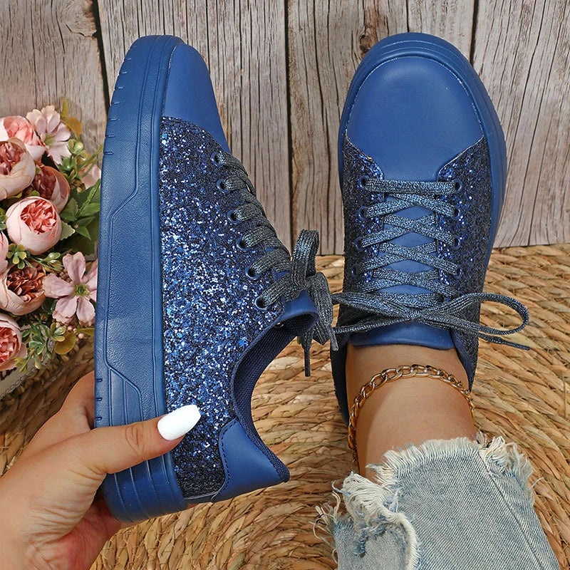Glittering sequin flats with thick soles and lace-up closure in various vibrant colours