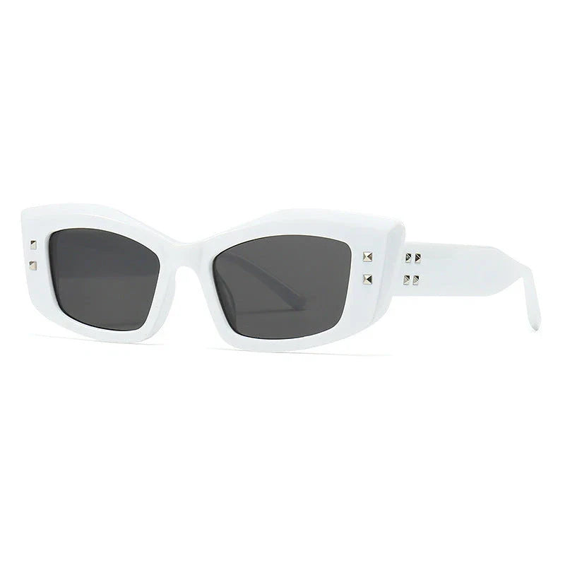 Retro cat eye sunglasses with rivet details, offering a stylish and protective eyewear solution.