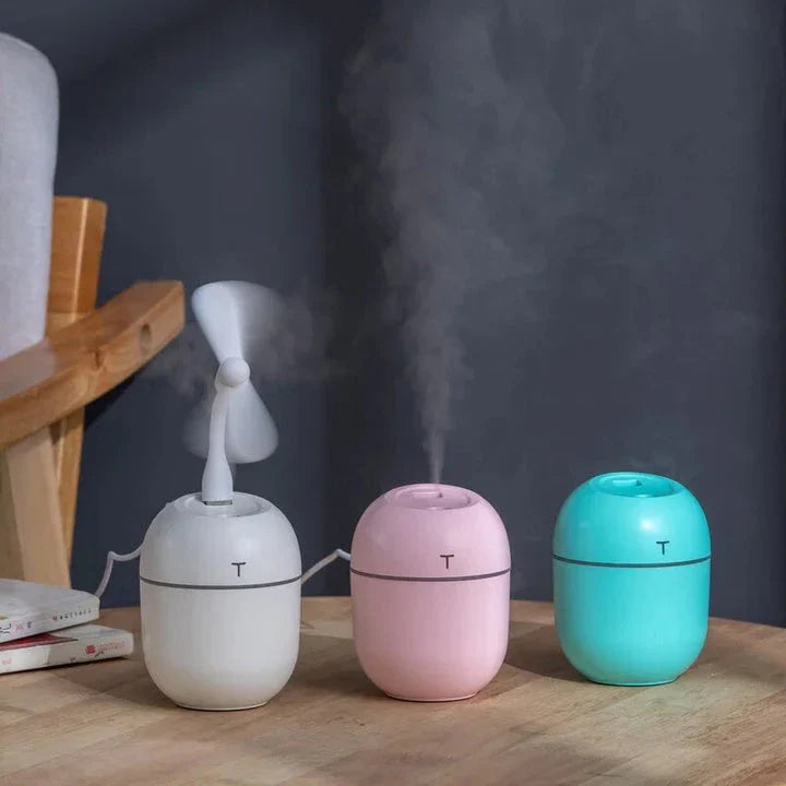 Compact ultrasonic humidifier and aroma diffuser with LED night lamp, available in white colour