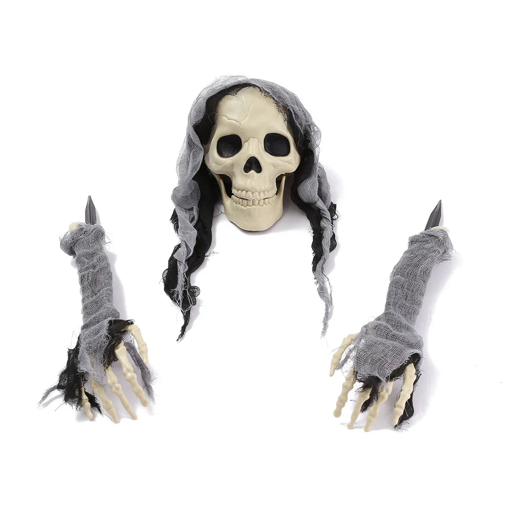 Three decorative plastic skull figures in green, red, and grey colours, perfect for Halloween home decor