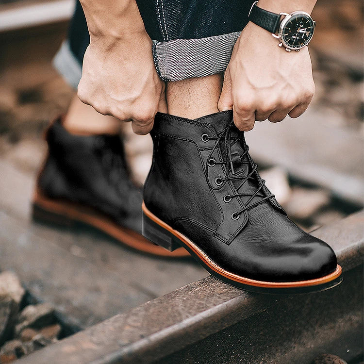 Stylish khaki Martin boots with a camouflage pattern, perfect for the modern British gentleman