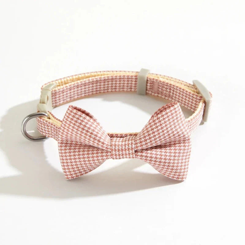 Stylish checkered pet collar with elegant butterfly knot decoration, perfect for dressing up cats and dogs