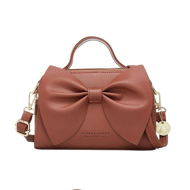 Elegant brown Korean-inspired bow shoulder bag with adjustable strap and roomy interior
