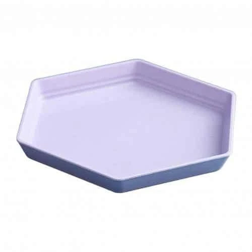 Hexagon-shaped wheat straw plate in a neutral beige colour, showcasing a modern and eco-friendly design