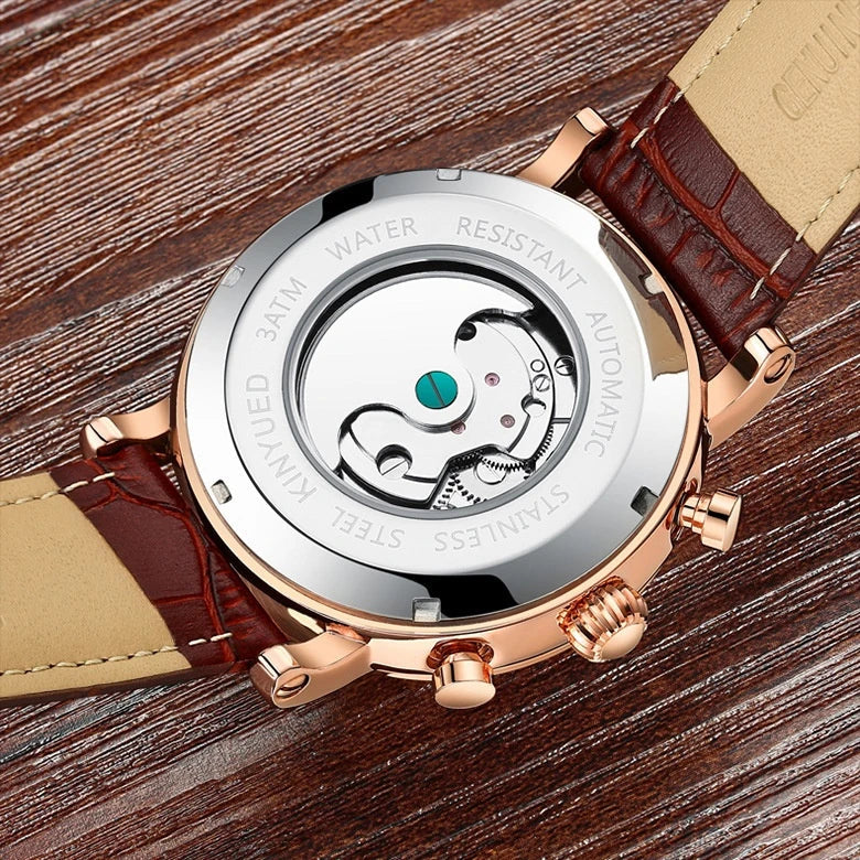 Automatic mechanical watch with genuine leather strap, featuring a stylish hollow-out dial design