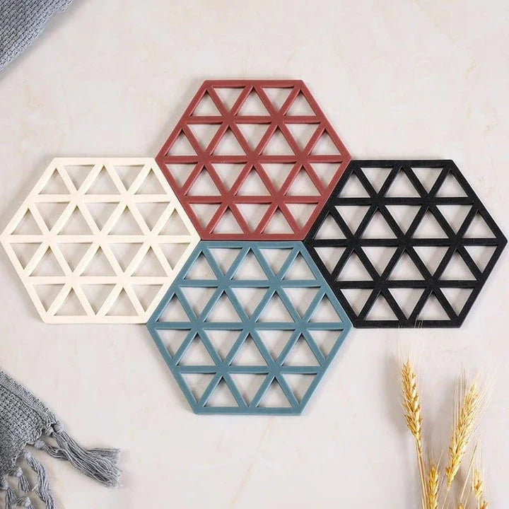 Geometric pattern cup coasters in a minimalist British design, made from durable rubber to protect surfaces