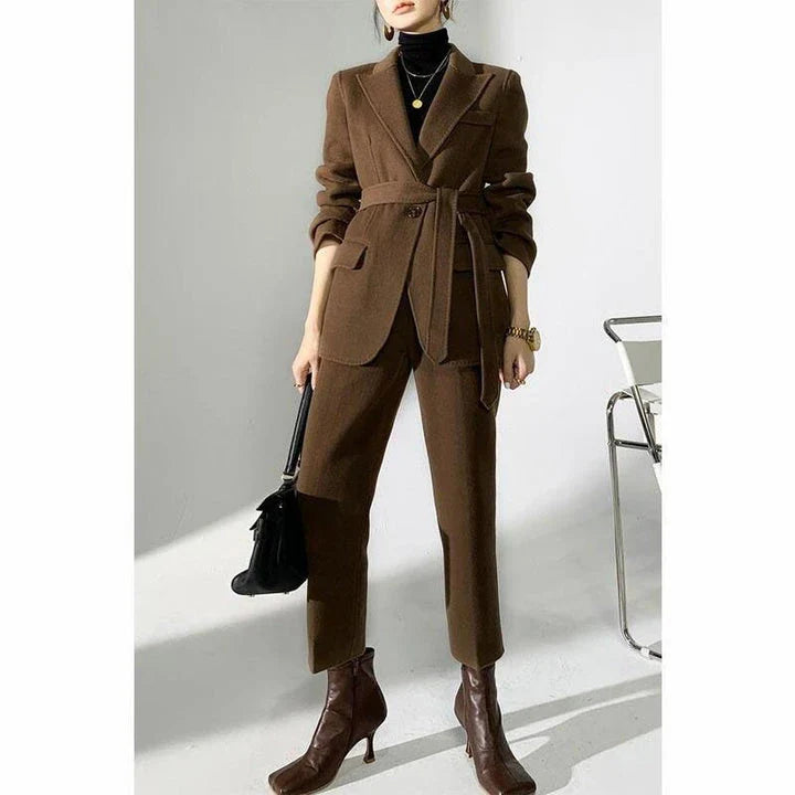 Elegant autumn-winter woollen pant suit with belted jacket and warm trousers for women