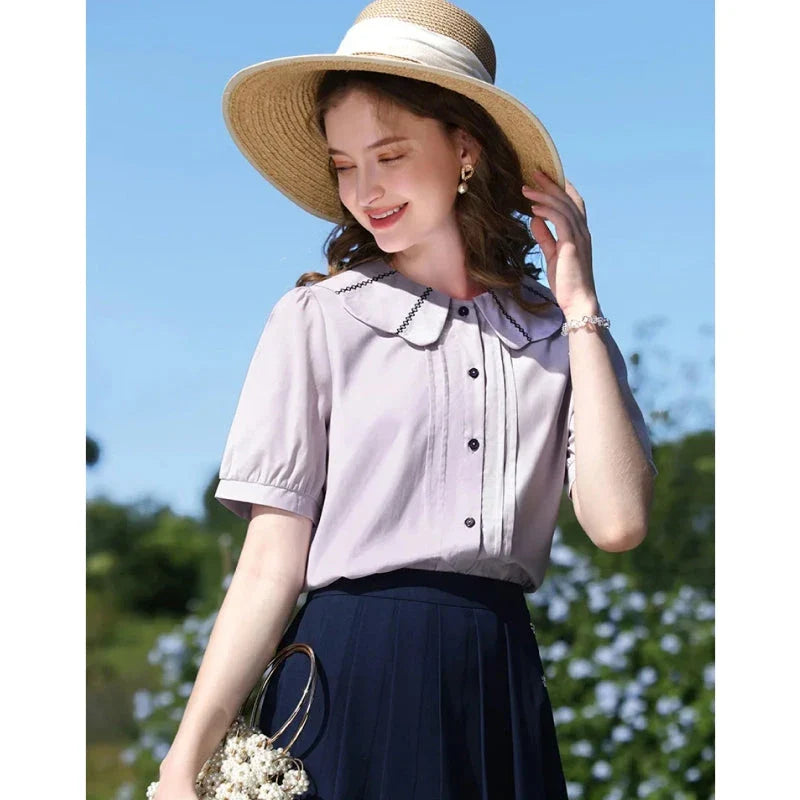 Elegant French puff sleeve blouse with timeless Peter Pan collar, available in purple and various sizes