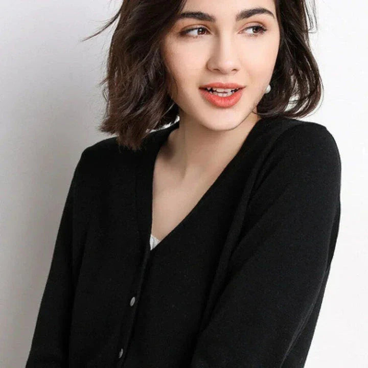 Chic v-neck single breasted cardigan in blue, green, and pink colours with a sophisticated and timeless design