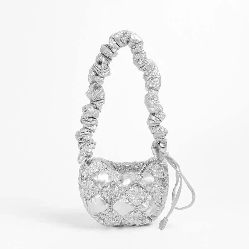 Stylish plaid quilted sling bag with adjustable strap for versatile shoulder or crossbody wear