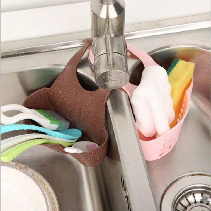 Adjustable stainless steel sink organiser rack with various colour options, designed to maximise kitchen sink space and keep essentials organised.