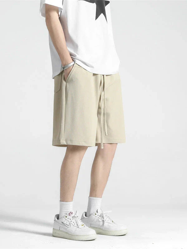 Premium straight-fit drawstring trousers in white, khaki, and black colours for stylish British men