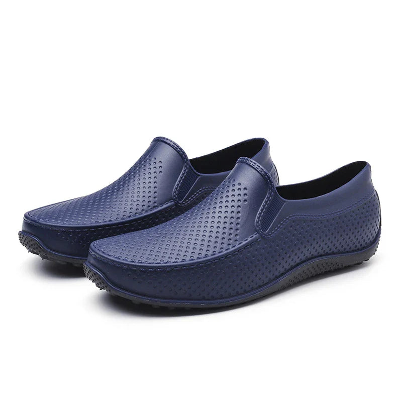Premium waterproof men's short rain boots in various classic colours, including black, black and red, and dark blue