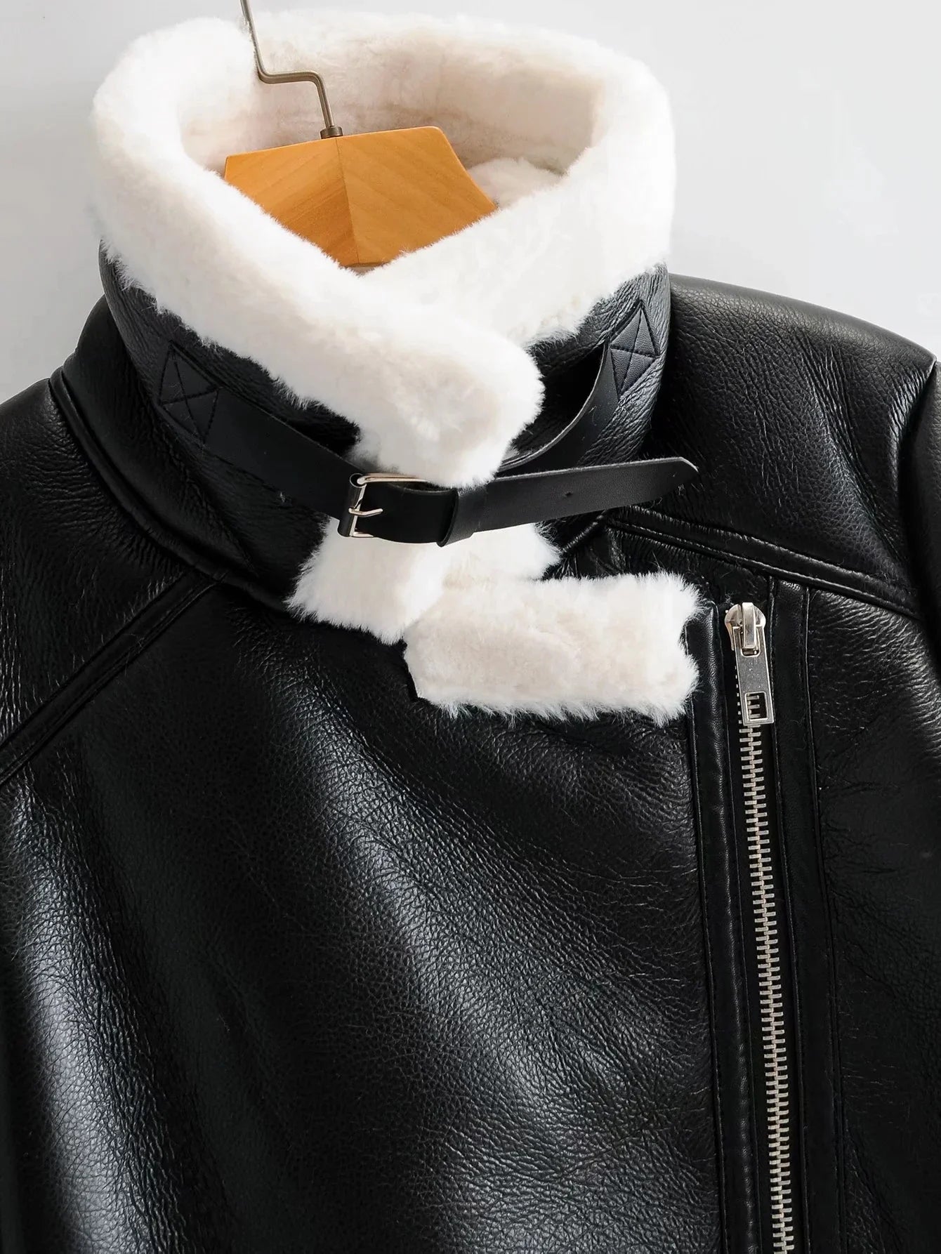 Warm faux leather jacket with plush faux fur lining, available in classic British colours for autumn and winter wear.