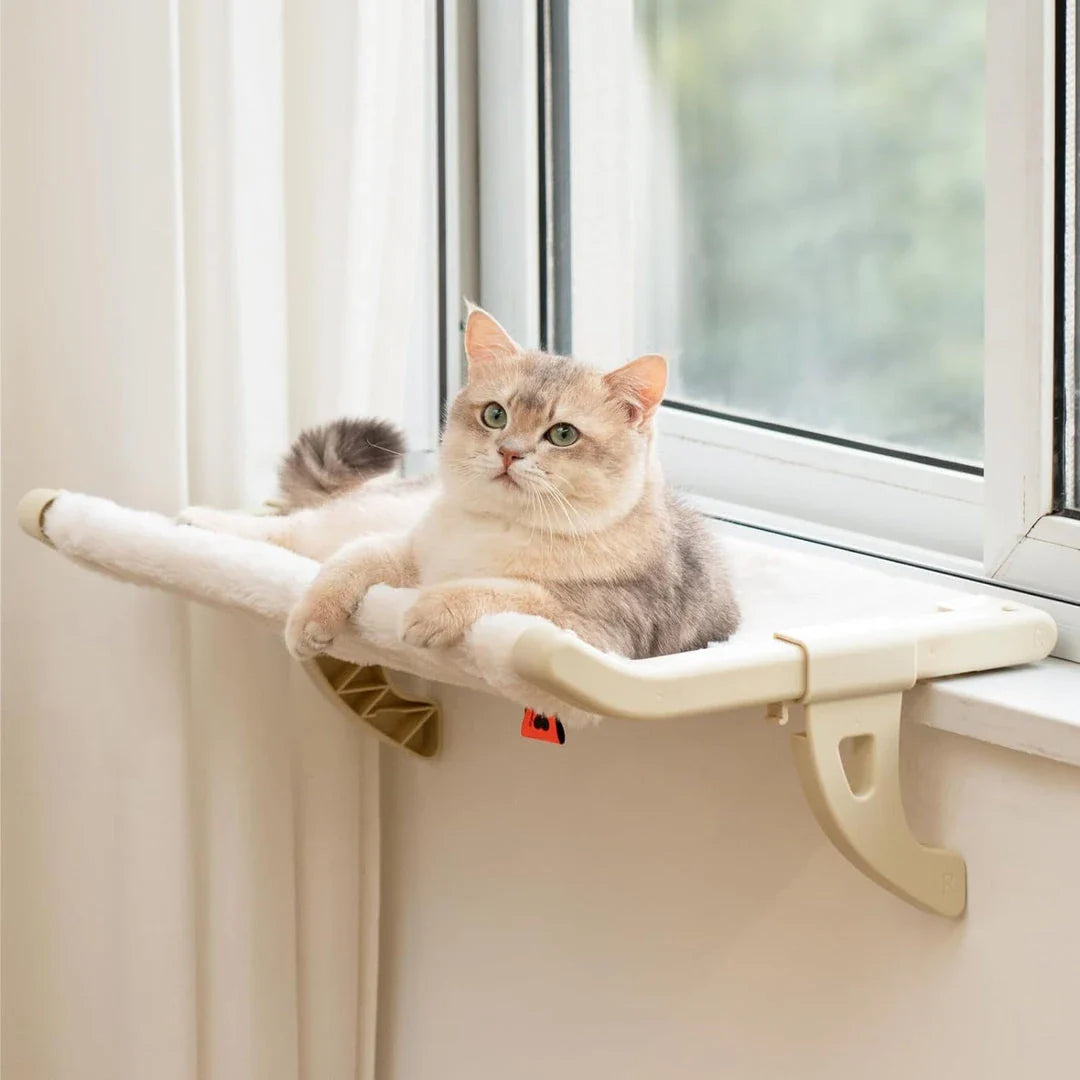 A stylish and durable cat hammock bed that attaches securely to any window, providing your feline friend with a cosy and elevated spot to relax.