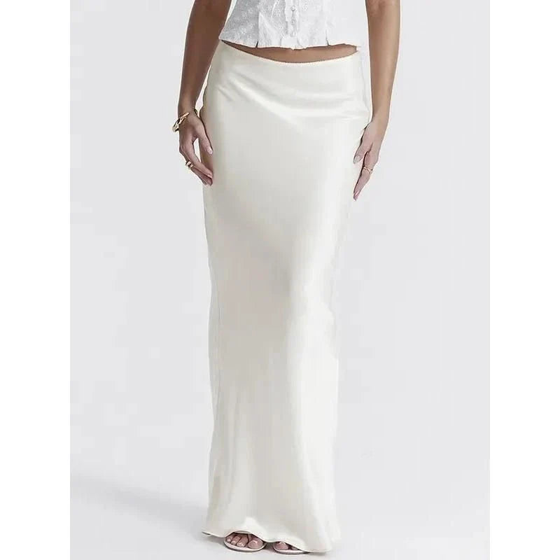 Sophisticated satin maxi skirt with adjustable waist, available in black colour and XS-L sizes
