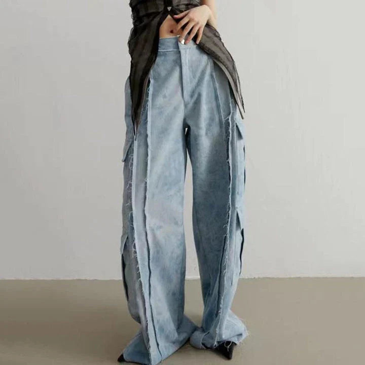 High-waisted tie-dye denim trousers with a straight-leg silhouette and practical pockets