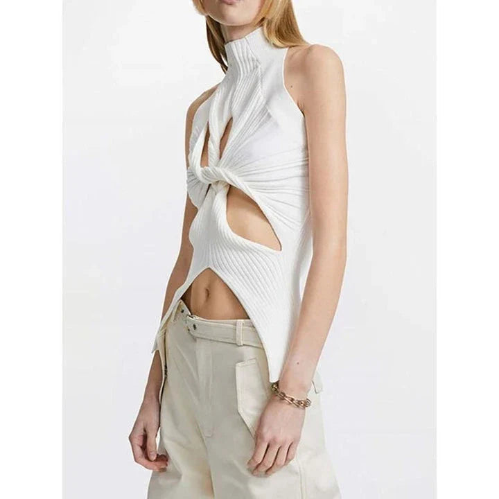 Elegant and versatile knitted sleeveless tank top with a unique hollow-out design, perfect for chic British style
