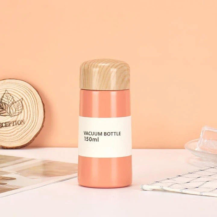 Stylish floral double-wall insulated water bottle with straw, made of high-quality stainless steel for long-lasting use and temperature control.