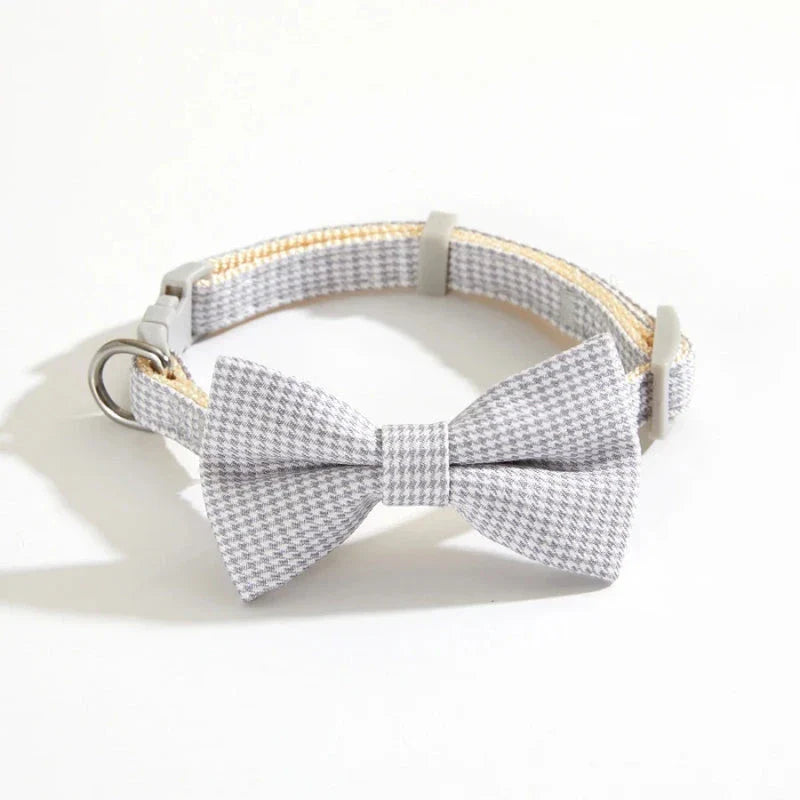Stylish checkered pet collar with elegant butterfly knot decoration, perfect for dressing up cats and dogs