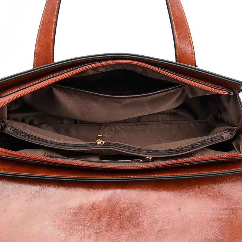 Premium crocodile pattern leather shoulder bag in multiple colours, featuring a pillow-shaped design for comfortable carrying and multiple interior pockets for organisation.