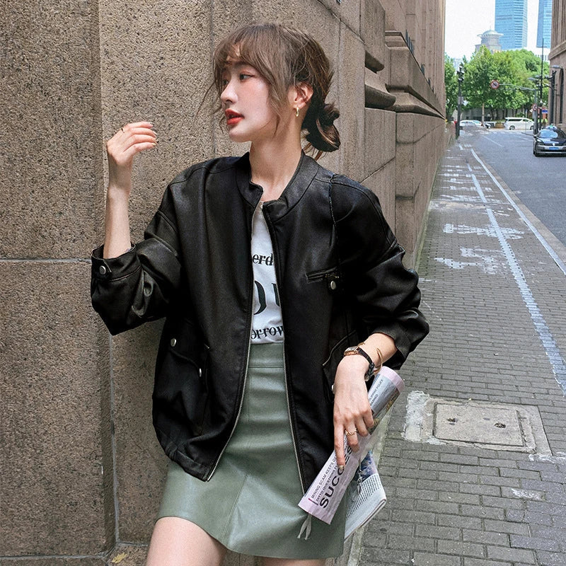 Stylish retro British autumn coat made with premium imitation leather, featuring a stand-up collar and zip-up front closure for a classic and durable look.
