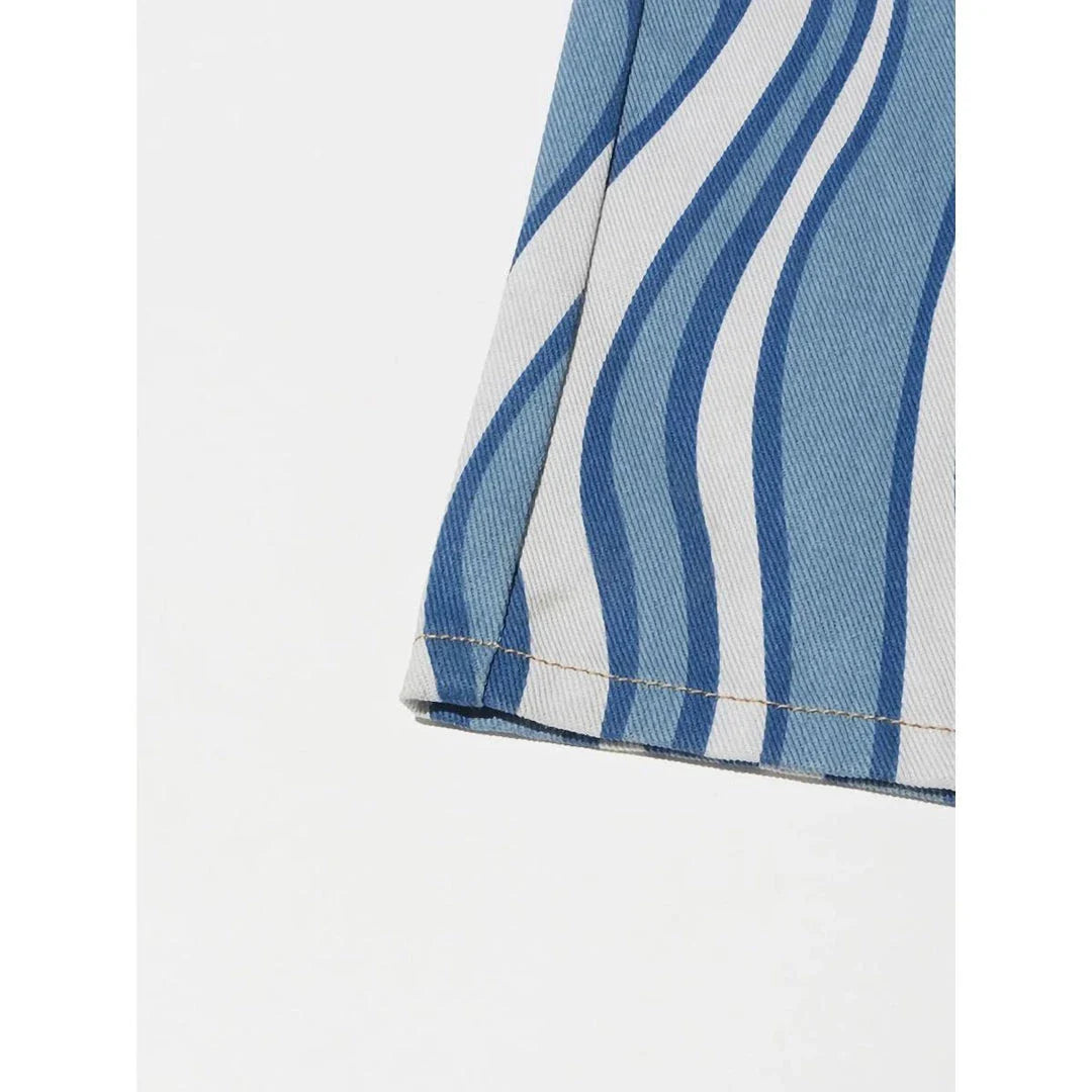 Women's high-waist striped denim trousers in a stylish blue colour, featuring a unique pattern and functional design for everyday wear.