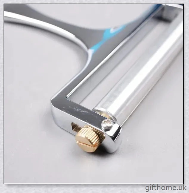 Adjustable cheese slicer with an ergonomic handle and a wire cutting mechanism for precisely slicing hard and soft cheeses to your desired thickness