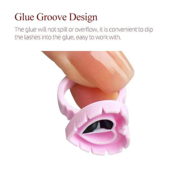 Heart-shaped disposable eyelash glue rings in blue, pink, and white colours