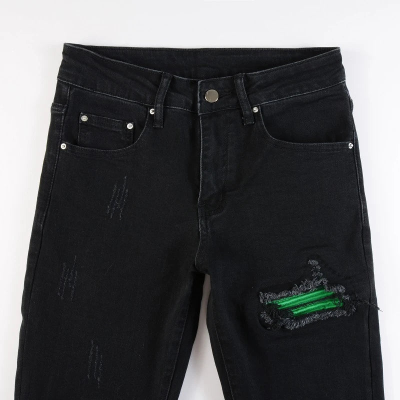 Premium ripped black jeans with stylish green patchwork design, made with medium-elastic fabric for comfort and a slim, flattering silhouette.