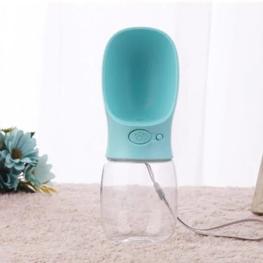 A leak-proof, portable pet water bottle in turquoise colour with a one-hand release button and locking mechanism