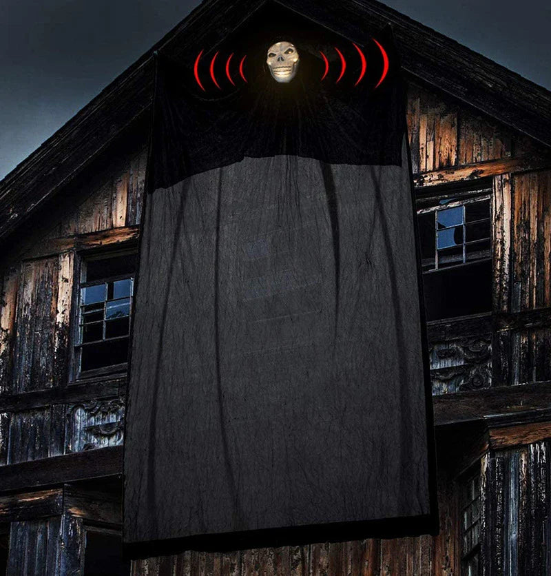 Voice-activated Halloween decoration with ghost-shaped design, lighting, and sound effects